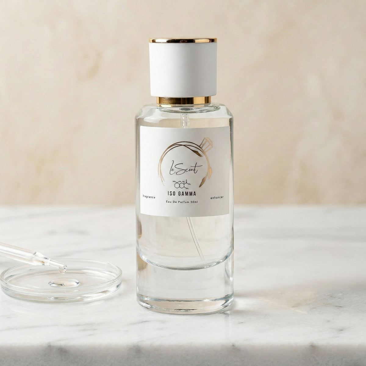 LeScent Iso Gamma perfume primer bottle on a marble surface with a glass pipette in a clean product photo.