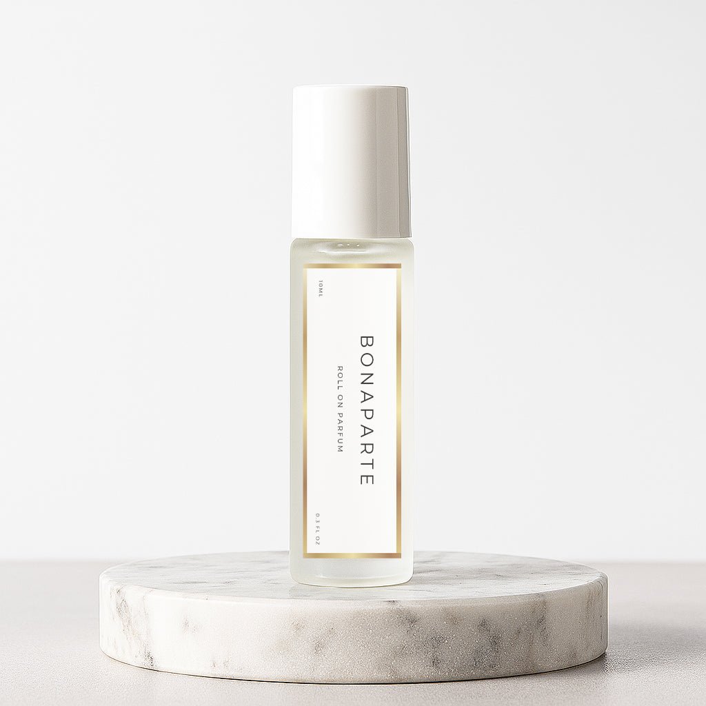 Bonaparte Roll-On Perfume Oil inspired by Creed Aventus on marble platform – minimalist white background – LeScent Australia