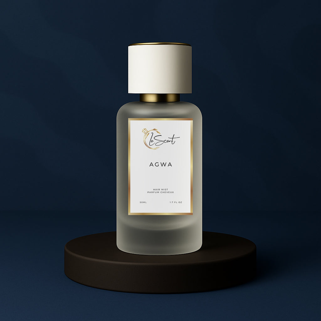 LeScent Agwa hair fragrance mist bottle displayed on a dark navy pedestal with moody blue background and elegant lighting, inspired by Armani Acqua Di Gio Profondo.