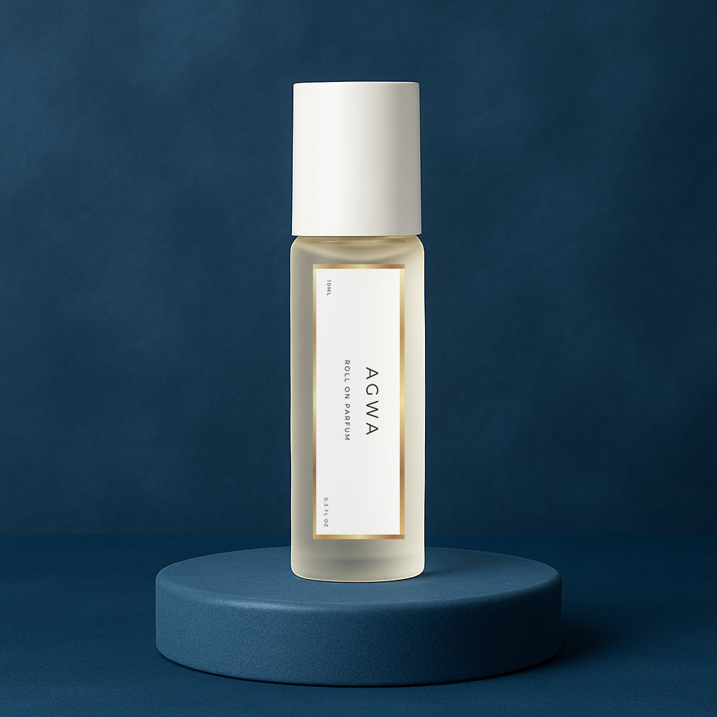 LeScent Agwa roll-on perfume oil bottle placed on a deep navy platform with soft marine-blue background and diffused lighting, inspired by Armani Acqua Di Gio Profondo.