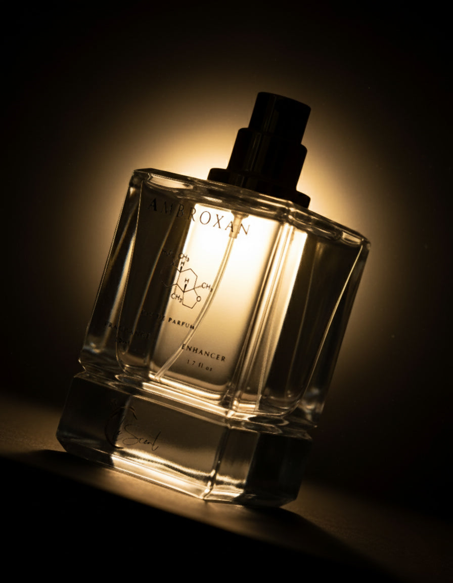 LeScent Ambroxan fragrance enhancer perfume primer spray bottle in a clean studio product photo with gold atomiser, inspired by Ambroxan.