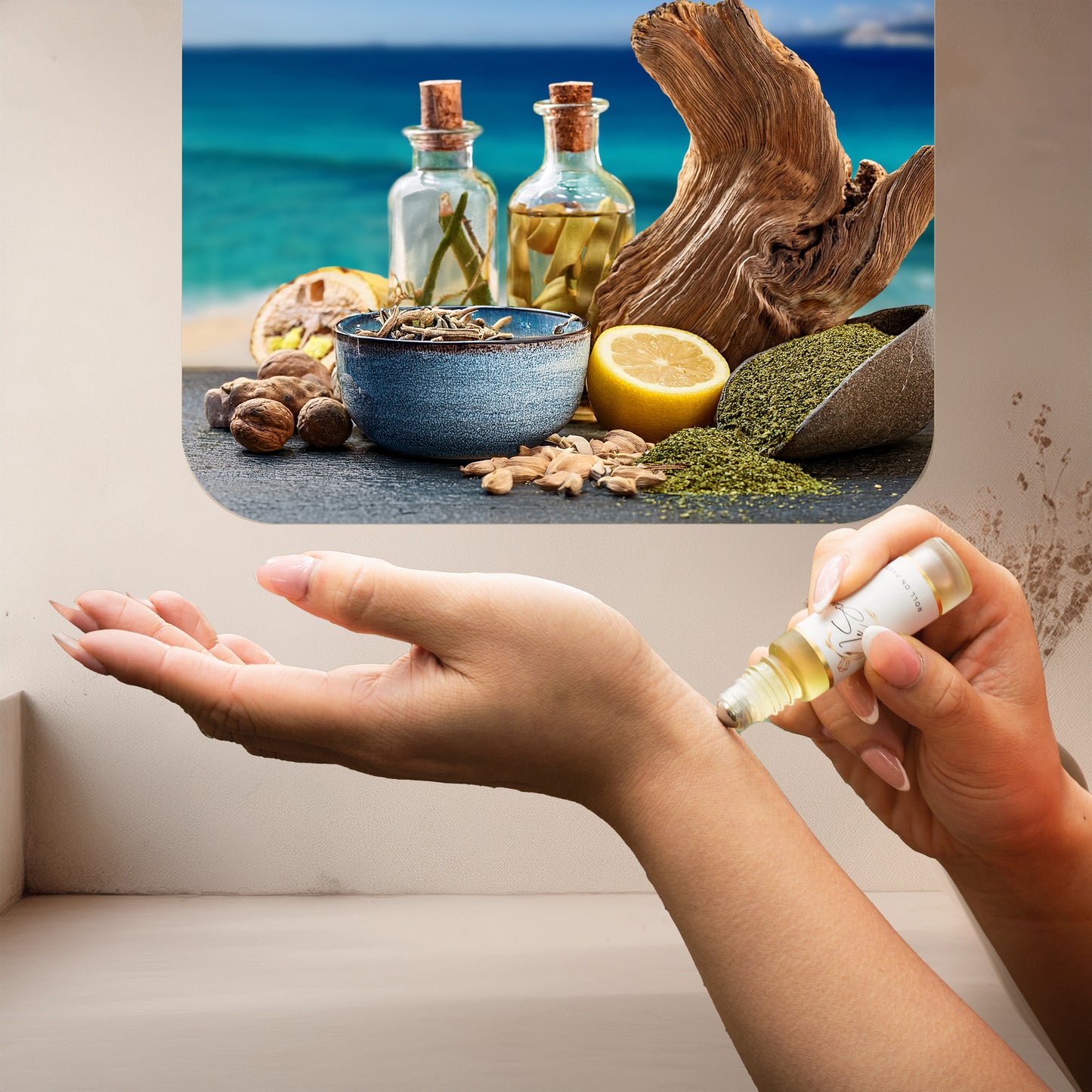 Applying LeScent Azura roll-on perfume oil onto the wrist beneath a coastal scene featuring driftwood, lemon, green herbs, blue ceramic bowls, and a turquoise ocean backdrop, inspired by Tom Ford Costa Azzurra.