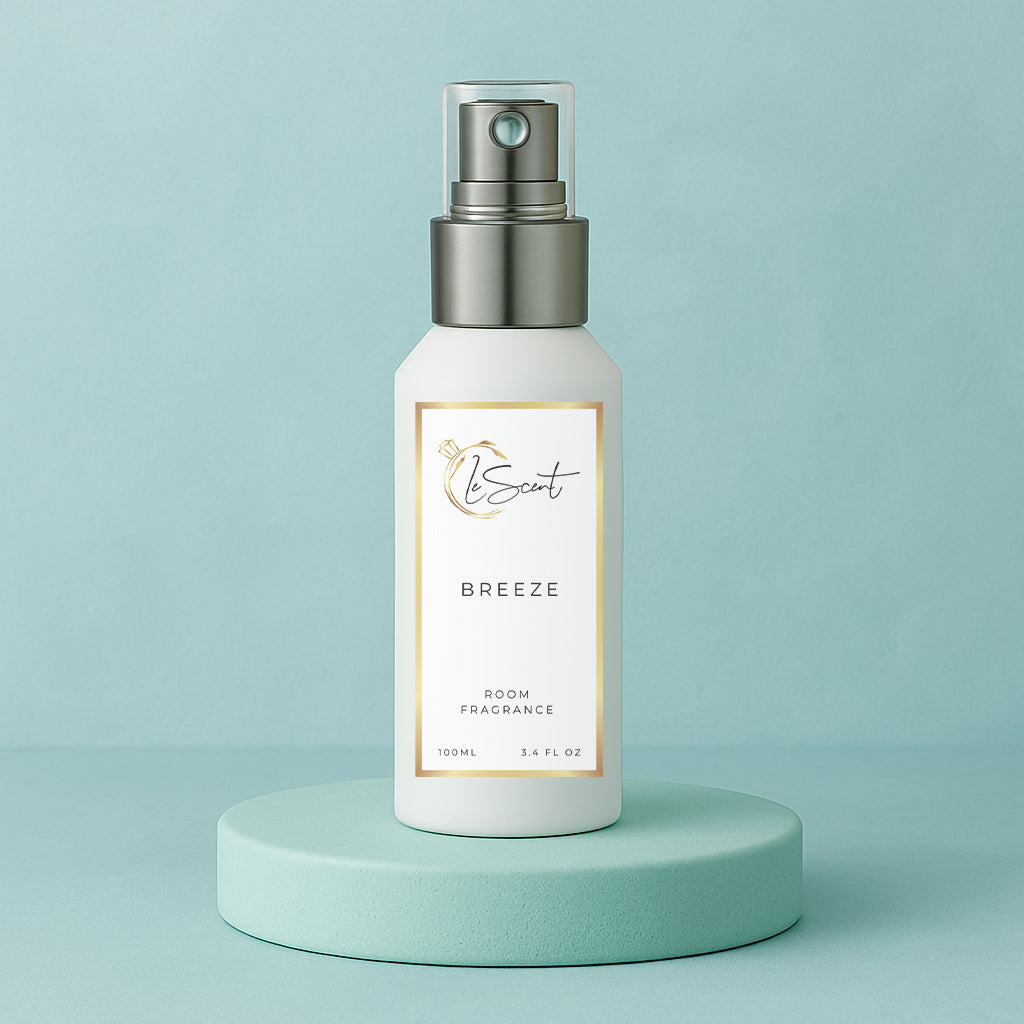 LeScent Breeze room fragrance spray bottle placed on a mint green pedestal with soft teal backdrop and clean minimalist lighting, inspired by Louis Vuitton Imagination.