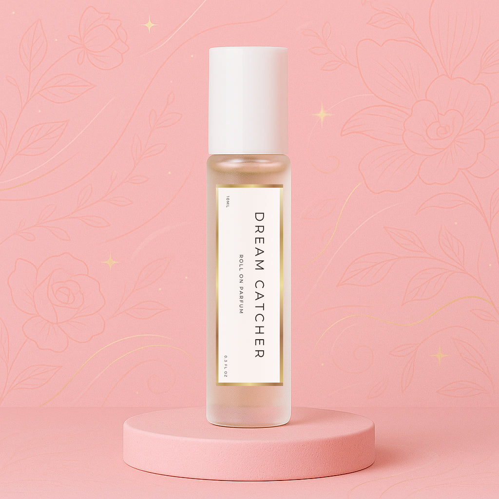 Luxury roll on perfume oil, parfum oil roller and roll on fragrance bottle standing on a soft pink platform with a floral background, inspired by Louis Vuitton Attrape Rêves.
