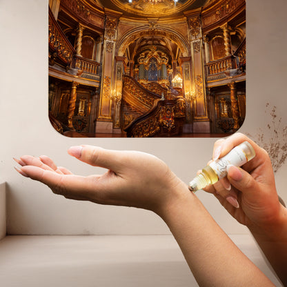 Applying LeScent Evening perfume oil, a warm and opulent ambery fragrance inspired by Maison Francis Kurkdjian Grand Soir, to the wrist.