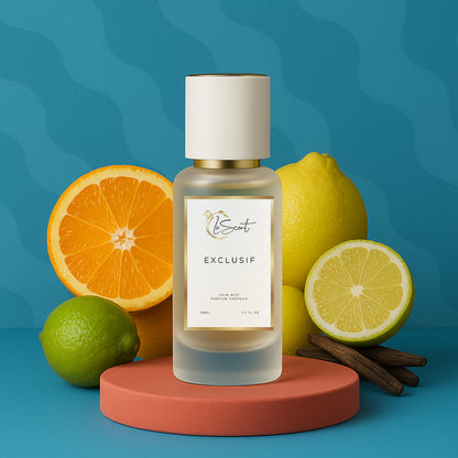 LeScent Exclusif hair perfume mist bottle surrounded by oranges, lemons, limes, and vanilla pods on a vibrant blue platform, inspired by Xerjoff Erba Pura.