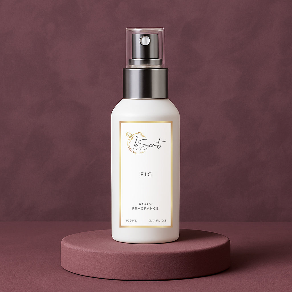 LeScent FIG room spray inspired by Le Labo Thé Noir 29 displayed on a plum pedestal with a smooth matching background.