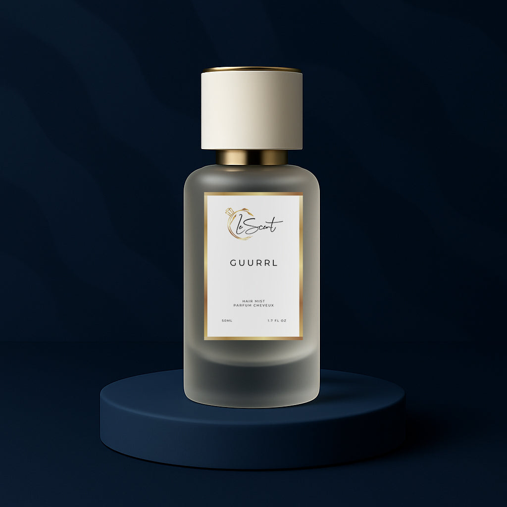 LeScent Guurrl hair mist bottle on a dark blue pedestal with a solid dark blue background, inspired by Carolina Herrera Good Girl.