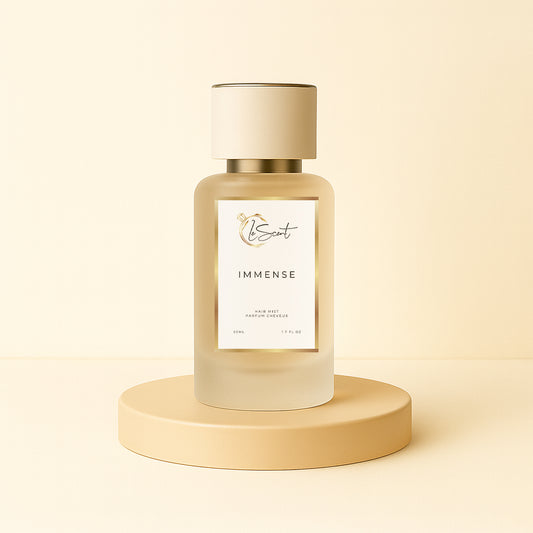 LeScent Immense hair perfume, hair fragrance, hair perfume mist bottle on a beige pedestal with a warm neutral background, styled as a clean hero presentation, inspired by Louis Vuitton L’Immensité.