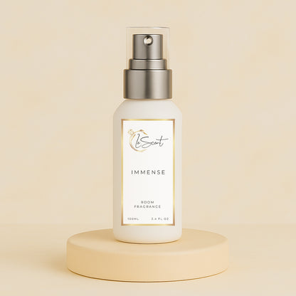 LeScent Immense room spray bottle on a beige pedestal with a soft neutral background, photographed as a clean studio hero image, inspired by Louis Vuitton L’Immensité.
