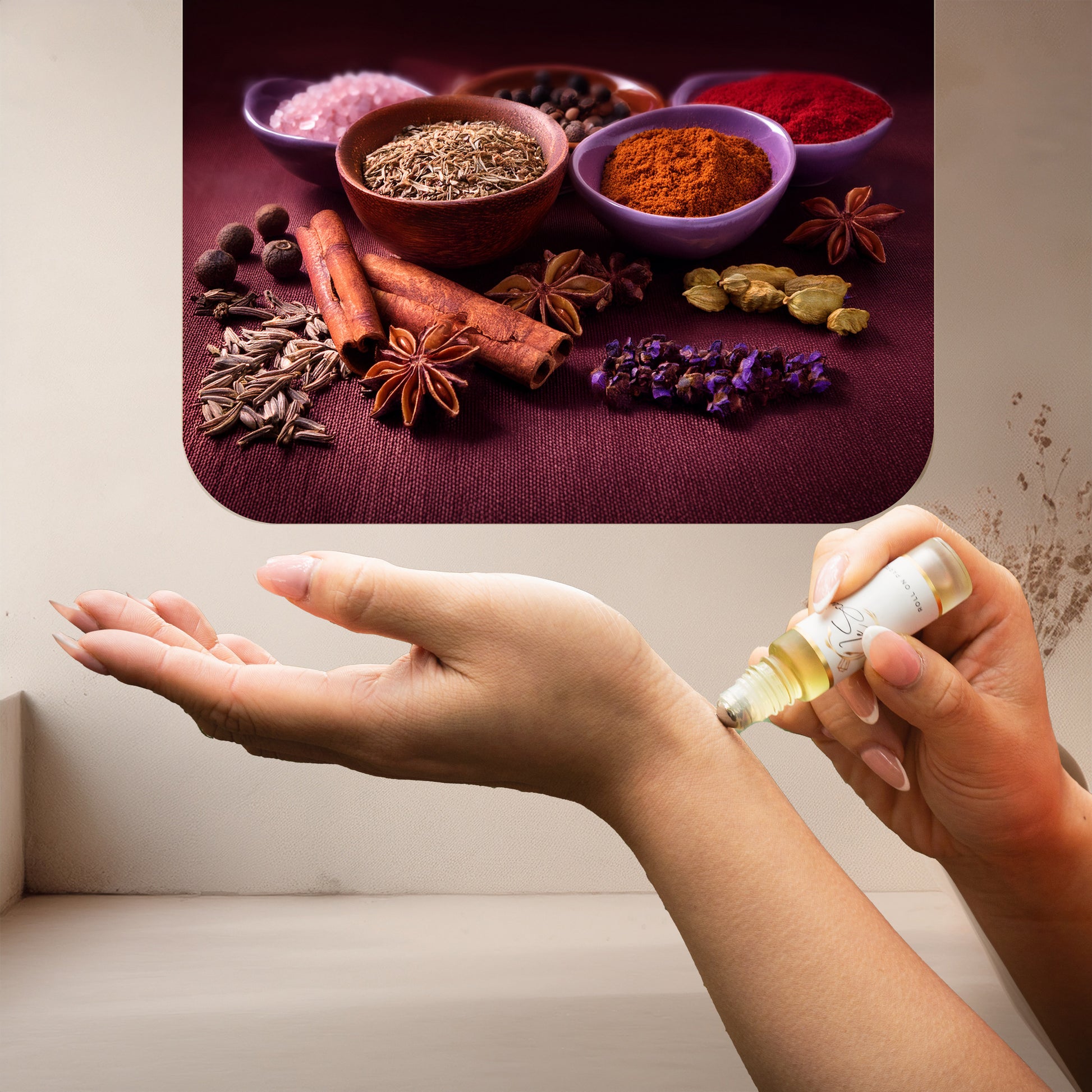 Applying LeScent Intense perfume oil roll-on inspired by Armani Stronger With You Intensely — blend of cinnamon, tonka bean and amber for a bold, long-lasting scent ritual.