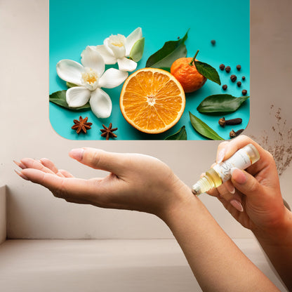 Applying LeScent Jasmine perfume oil roll-on inspired by Gucci Flora Gorgeous Jasmine — bright mandarin and white floral notes for a joyful and uplifting feeling.