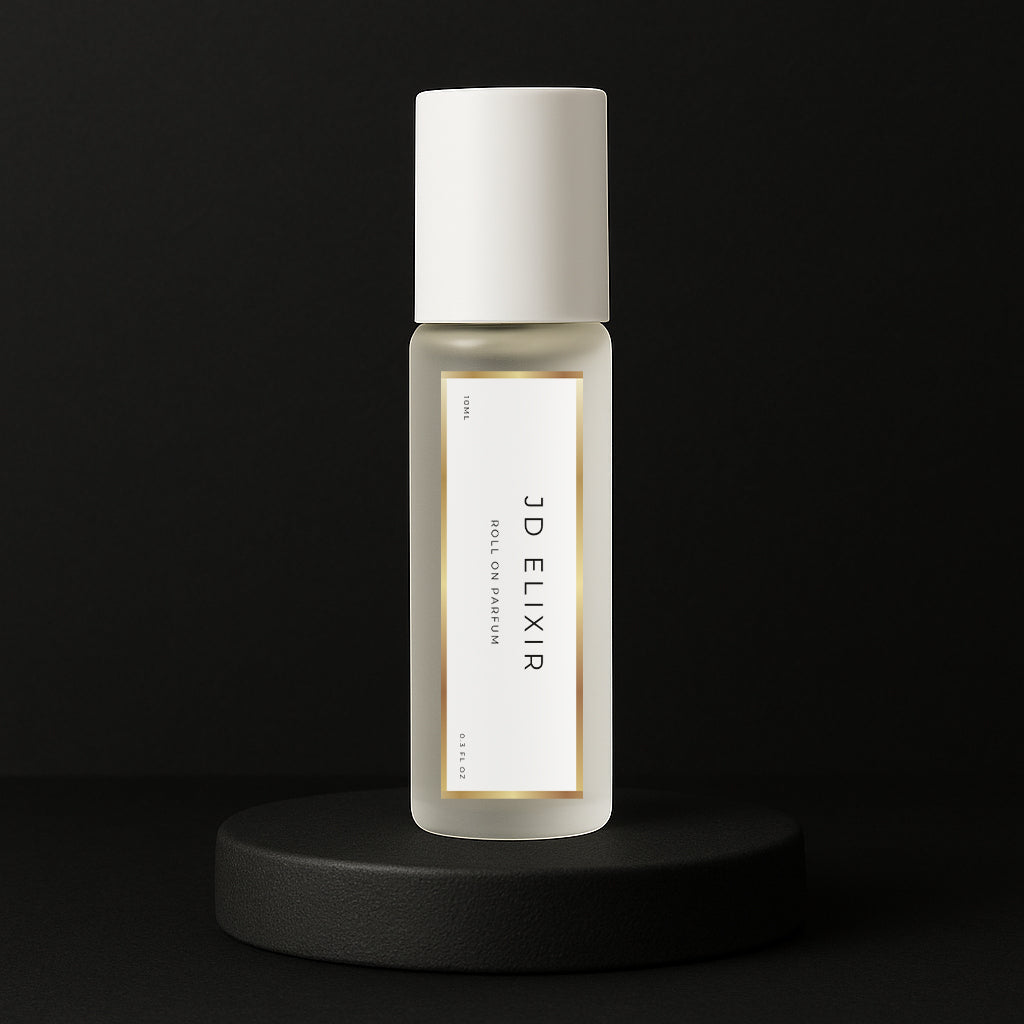 LeScent JD Elixir perfume oil roll-on bottle on a black pedestal with a solid black background, inspired by Dior Sauvage Elixir.