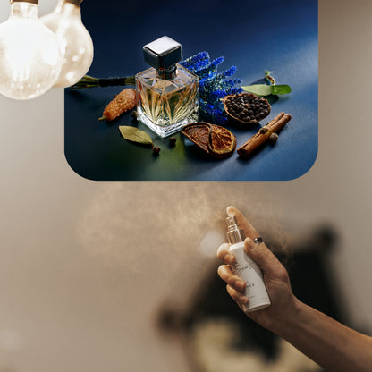 Spraying LeScent JD home fragrance air freshener, a spicy and aromatic scent with lavender, pepper, and cinnamon accords, inspired by Dior Sauvage EDP.