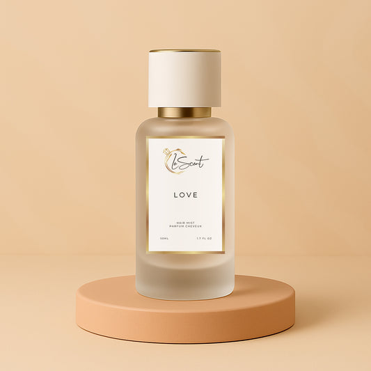 LeScent Love hair fragrance mist bottle displayed on a peach platform with soft light and warm pastel background, inspired by Armani Si.