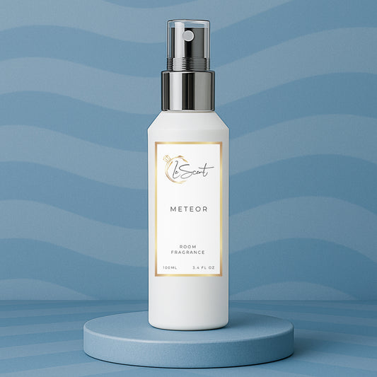 LeScent Meteor room spray, room fragrance, home fragrance freshener mist bottle displayed on a blue platform with a soft wave-pattern blue background, inspired by Louis Vuitton Météore.