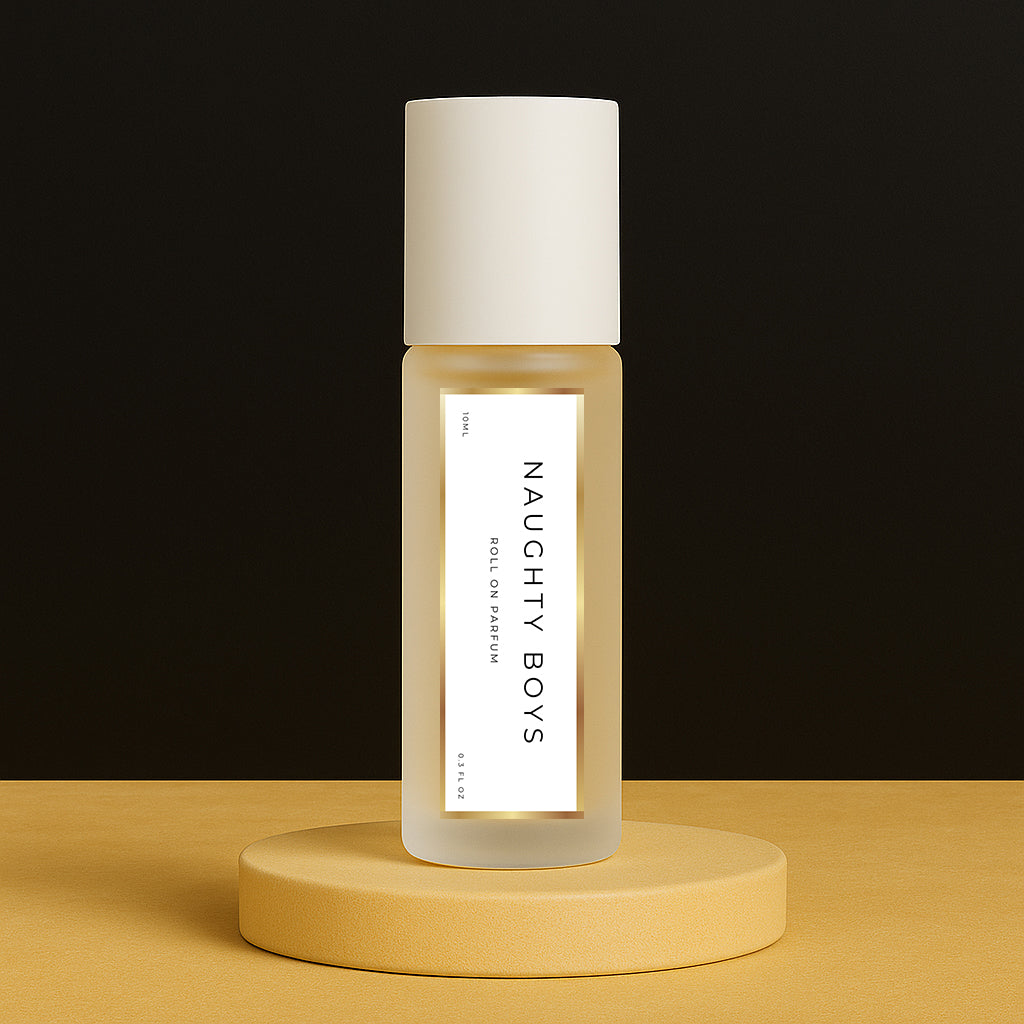 LeScent Naughty Boys perfume oil roll-on inspired by Bad Boy — spicy pepper, tonka bean, and cacao for a complex and rebellious scent.