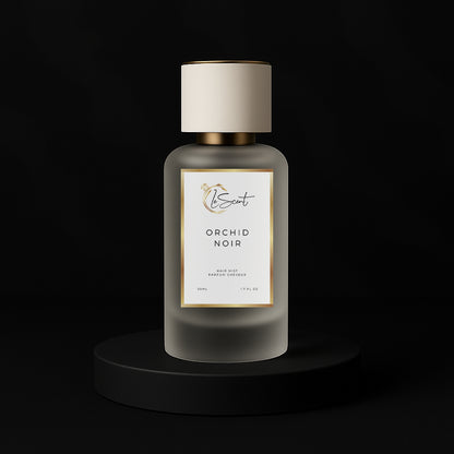 LeScent Orchid Noir hair mist inspired by Tom Ford Black Orchid — frosted bottle with orchids and almonds on black backdrop.
