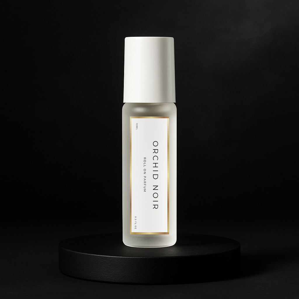 LeScent Orchid Noir perfume oil roll-on inspired by Tom Ford Black Orchid — frosted bottle on matte black pedestal.