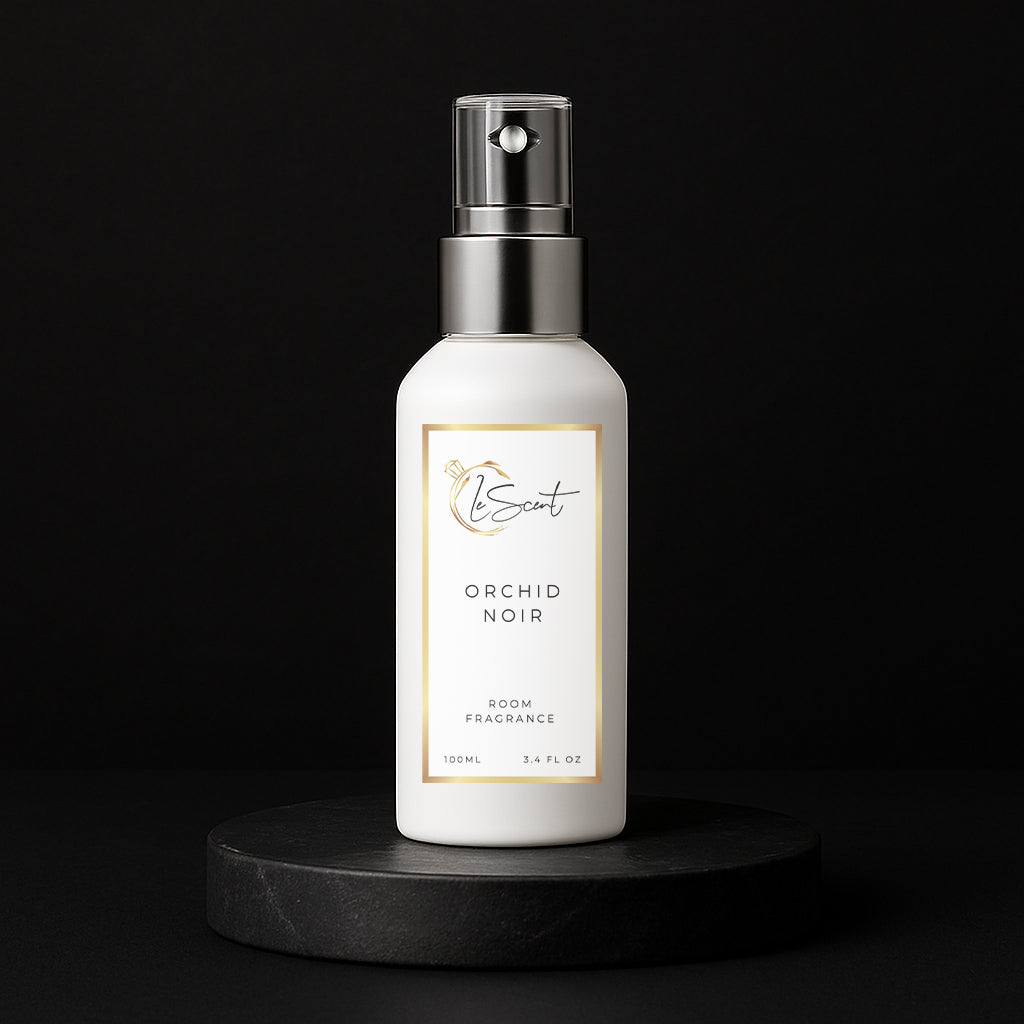 LeScent Orchid Noir room spray inspired by Tom Ford Black Orchid — white bottle on dark matte pedestal.
