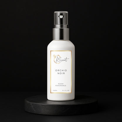 LeScent Orchid Noir room spray inspired by Tom Ford Black Orchid — white bottle on dark matte pedestal.