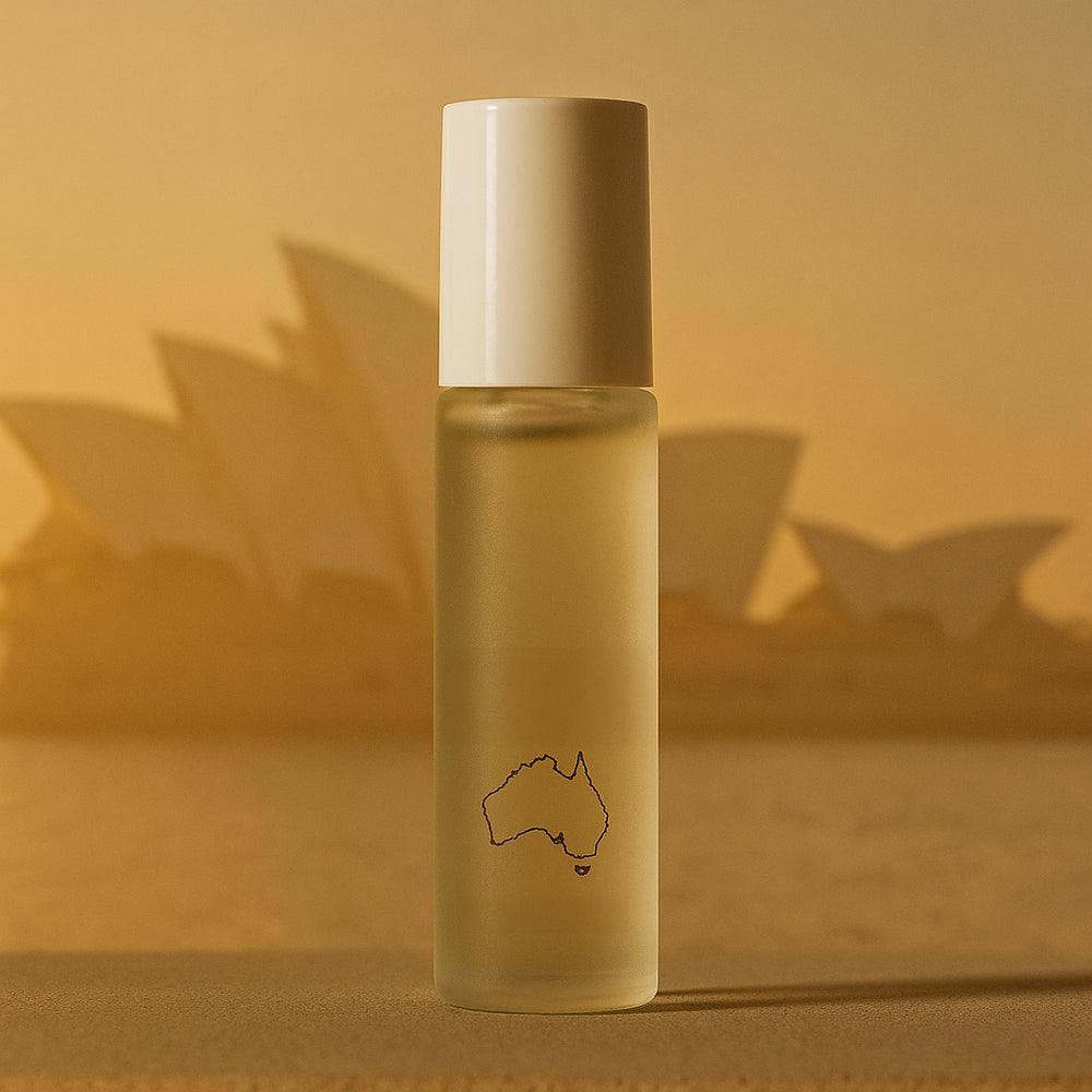 LeScent perfume roll-on bottle featuring Australia outline with Sydney Opera House background.