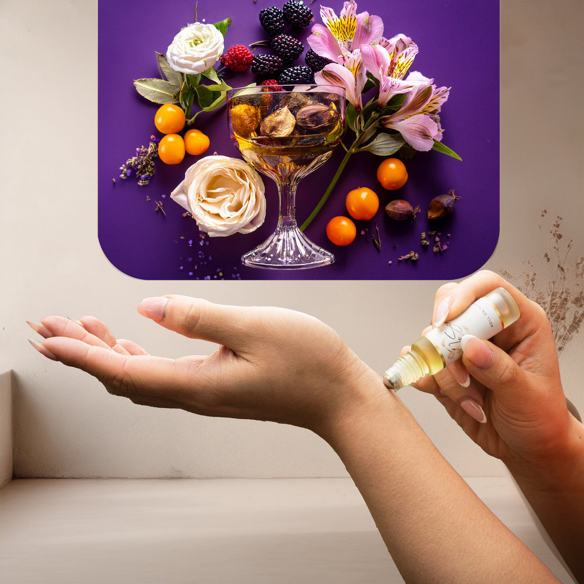 Applying LeScent Poison Ivy perfume oil, a rich almond and vanilla fragrance inspired by Dior Hypnotic Poison, to the wrist.