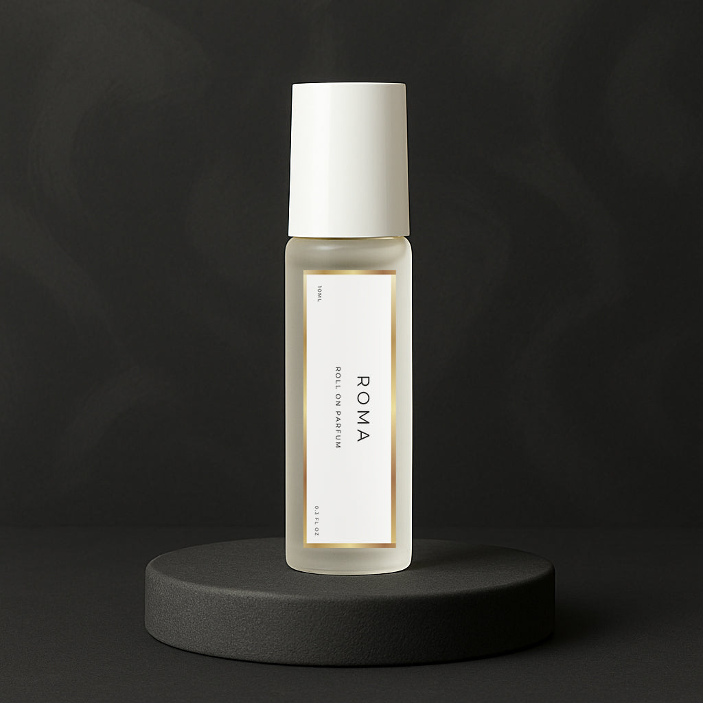 LeScent Roma roll-on perfume oil bottle standing on a matte charcoal platform with soft lighting and dark background, inspired by Valentino Uomo Born In Roma.