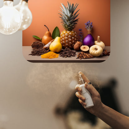 Spraying LeScent SER room spray inspired by Givenchy Gentleman — masculine home fragrance freshener mist with notes of pear, pineapple, and lavender.