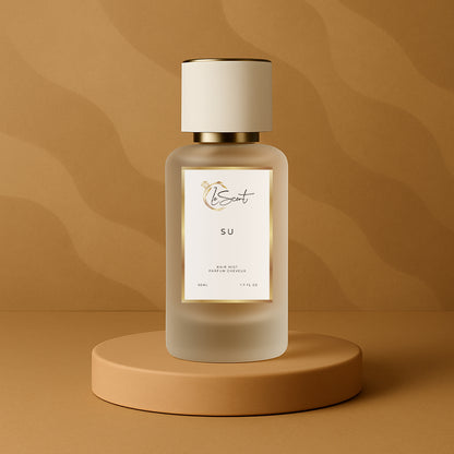 LeScent SU hair fragrance mist bottle placed on a warm beige pedestal with a smooth tan background and soft gradients, inspired by Kayali Vanilla 28.