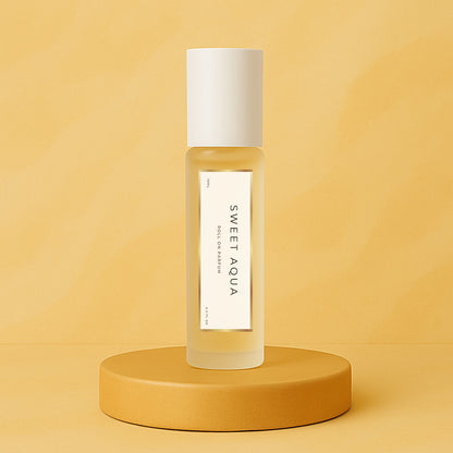 LeScent Sweet Aqua perfume oil roll-on bottle on a warm yellow pedestal with a matching soft yellow background, styled as a clean hero product image, inspired by Creed Millésime Impérial.