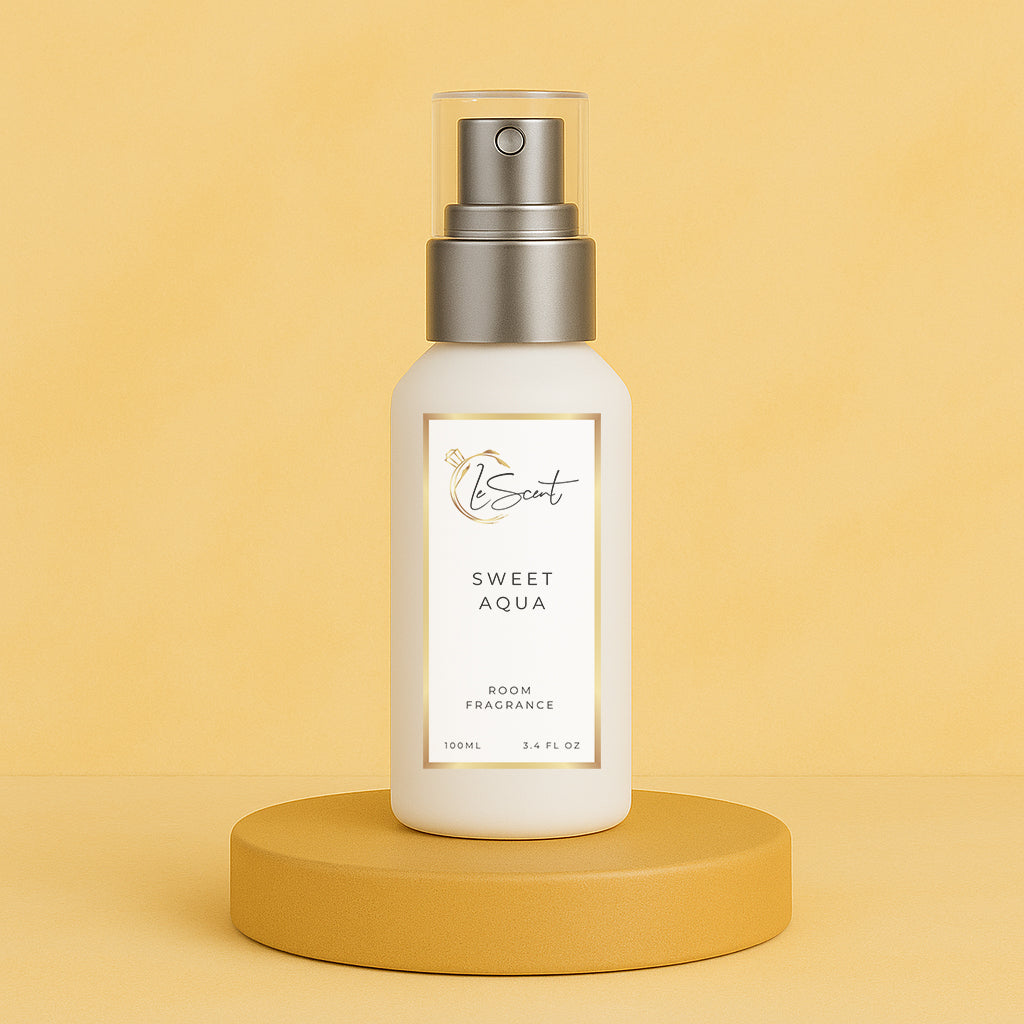 LeScent Sweet Aqua room spray bottle on a yellow pedestal with a solid warm yellow background, photographed as a clean hero shot, inspired by Creed Millésime Impérial.