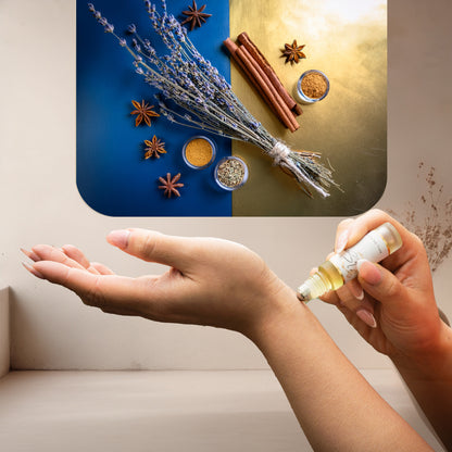 Applying LeScent The Date roll-on perfume oil inspired by Jean Paul Gaultier Ultra Male — aromatic lavender and cinnamon with pear and vanilla for a long-lasting seductive scent.