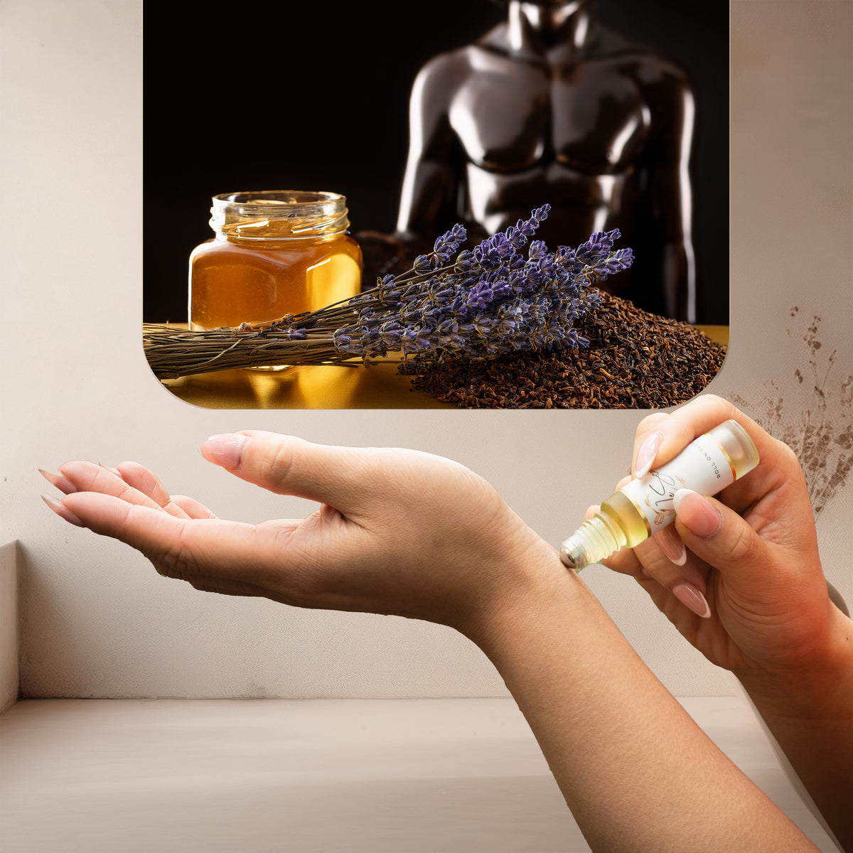Applying LeScent The Man perfume oil roll-on inspired by Jean Paul Gaultier Le Male Elixir — notes of lavender, vanilla and honey for an intense masculine fragrance ritual.