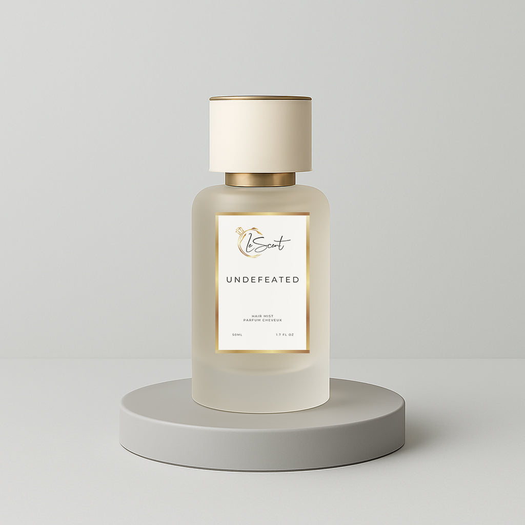 LeScent Undefeated hair perfume, hair fragrance and hair perfume mist bottle on a soft grey background inspired by Paco Rabanne Invictus.