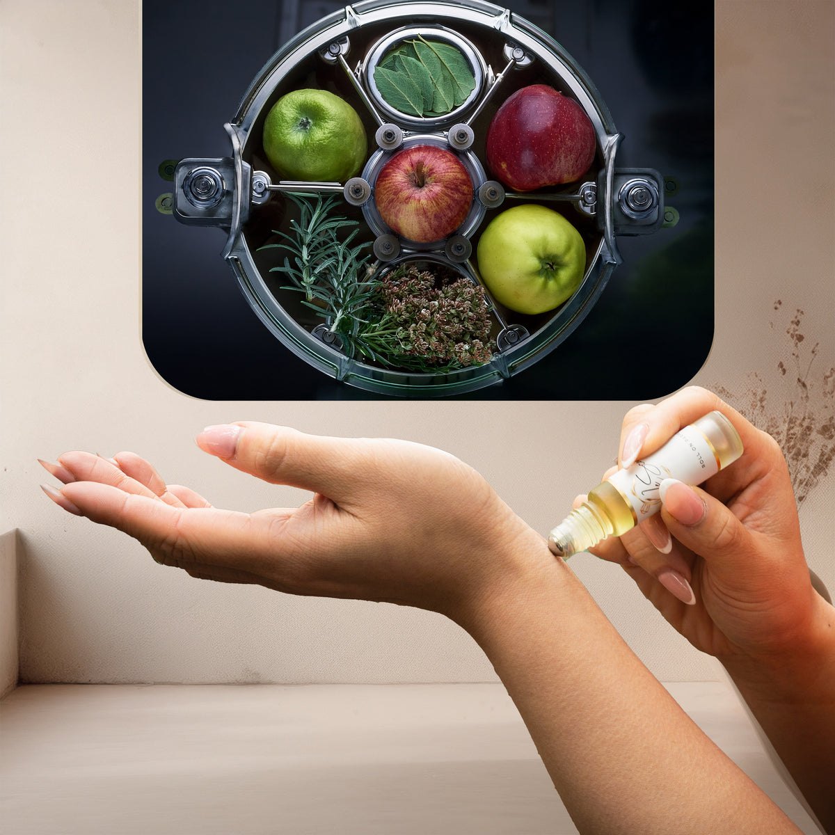 Applying LeScent Why roll-on perfume oil on wrist beside green apples, herbs, and bay leaves in a metallic circular frame, inspired by YSL Y.