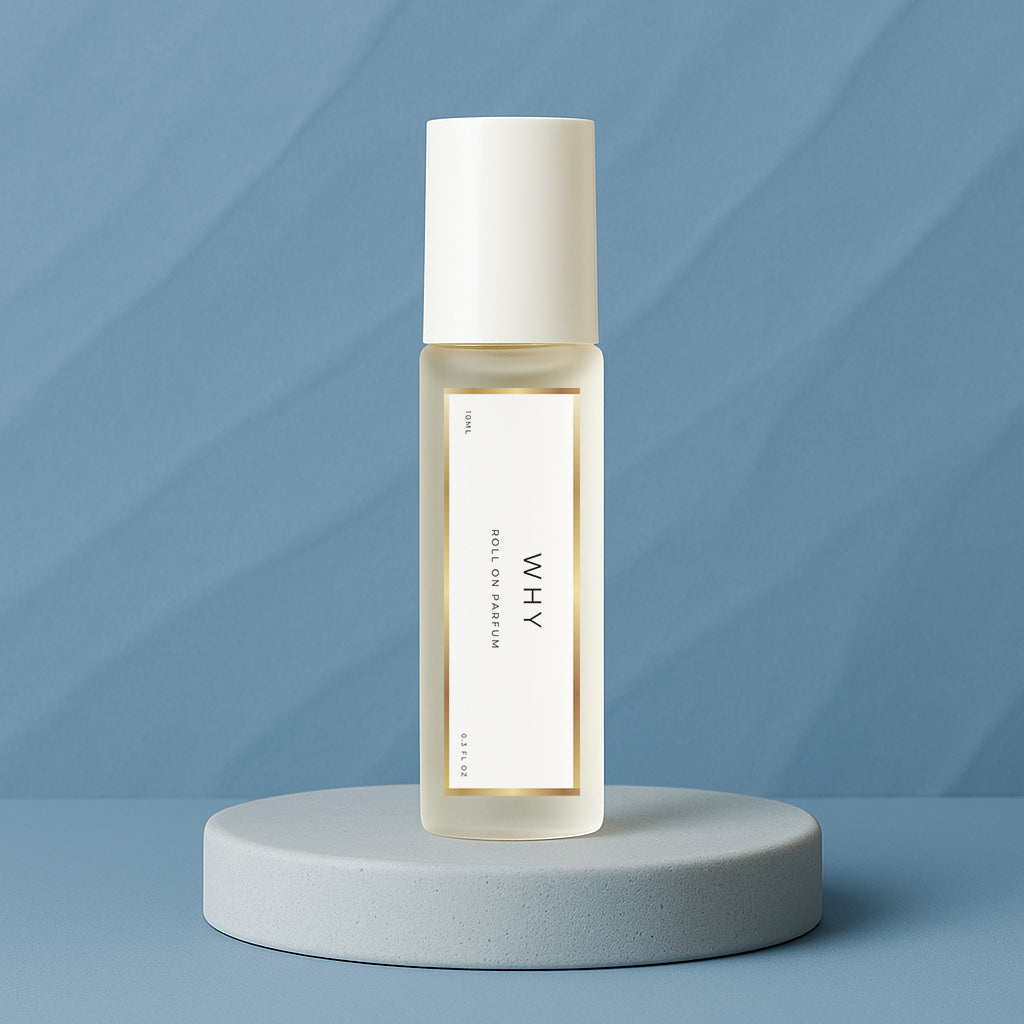 LeScent Why roll-on perfume oil bottle placed on a cool blue platform with soft matte background and clean lighting, inspired by YSL Y.