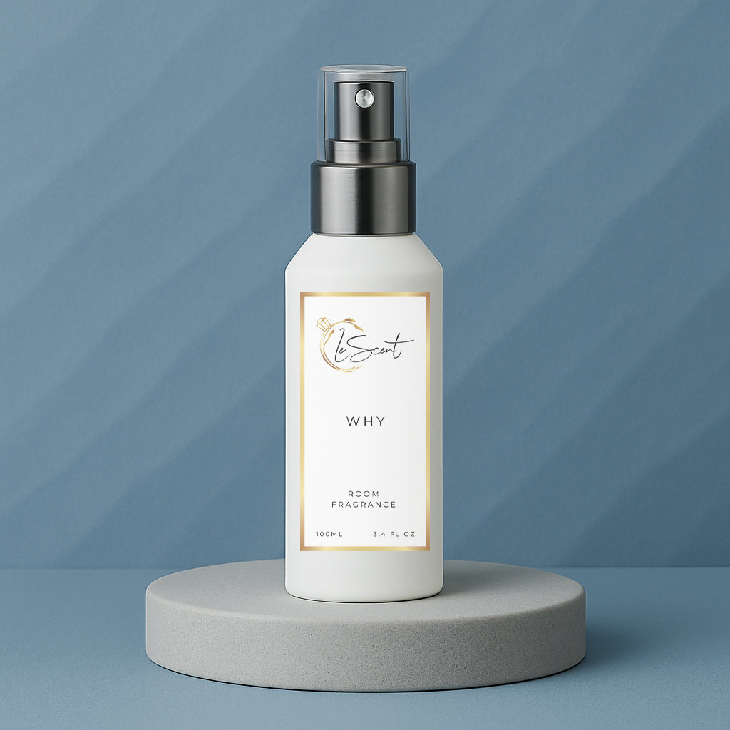 LeScent Why room fragrance spray bottle displayed on a grey-blue pedestal with subtle textured background, inspired by YSL Y.
