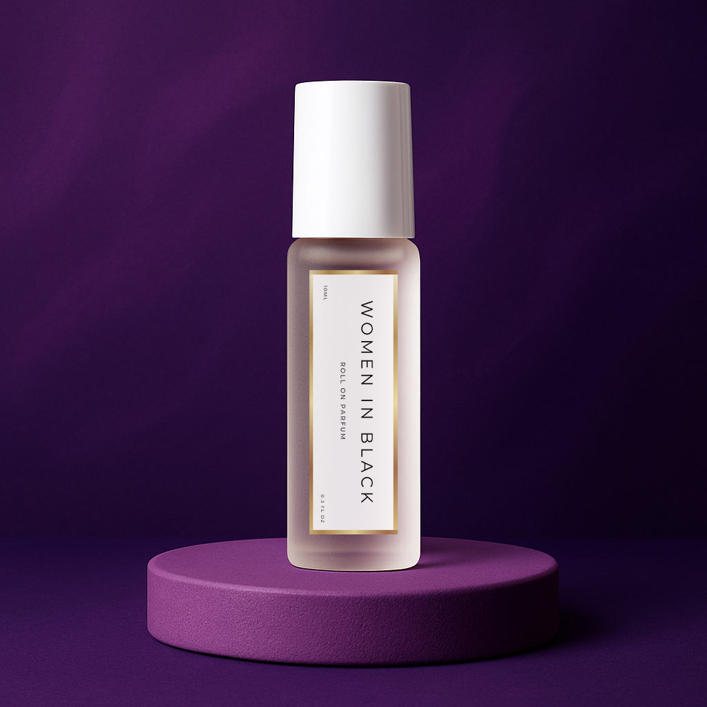 LeScent Women In Black perfume oil roll-on bottle on a purple pedestal with a solid dark purple background, inspired by Mugler Alien.